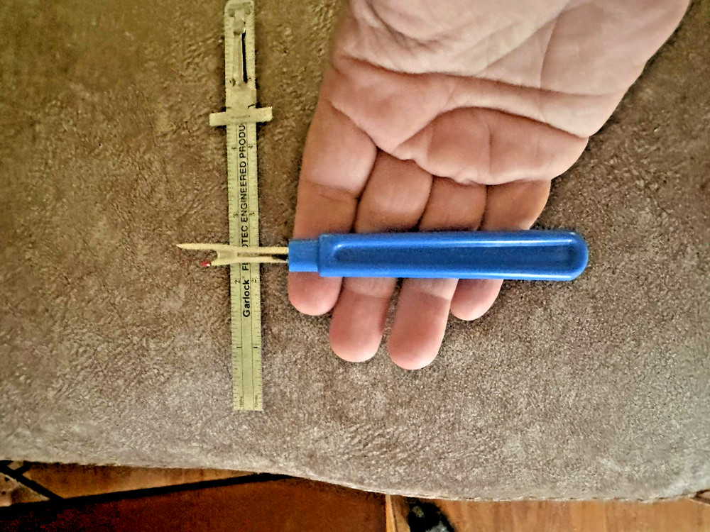 Garlock Slide Ruler and a Seam Ripper