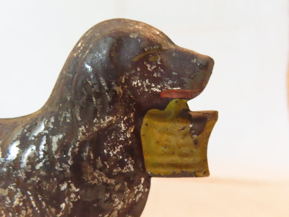 Antique tin dog pull toy