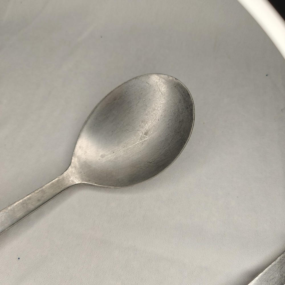 Vollrath 46952 12" Stainless Solid Spoon w/Plastic Coated Handle