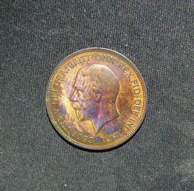 Two Old UK Pennies