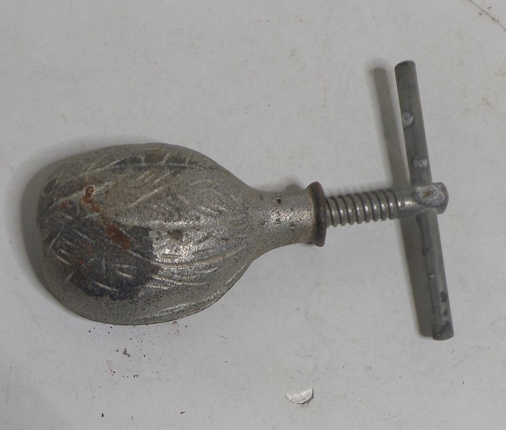 cast iron nut cracker vintage