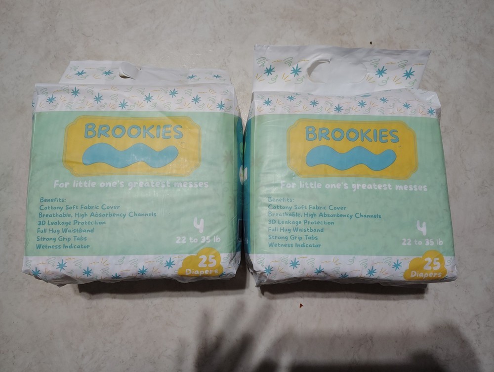 (4) BROOKIES SOFT  & DRY SIZE 4  DIAPERS