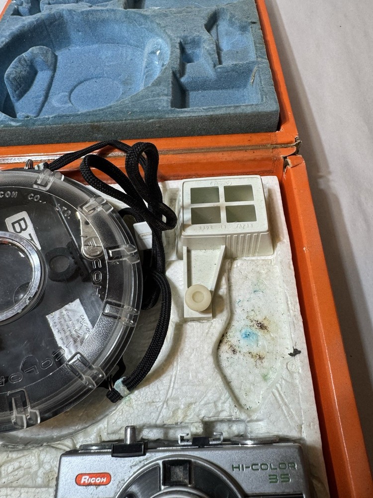 Ricoh 35 with underwater housing package