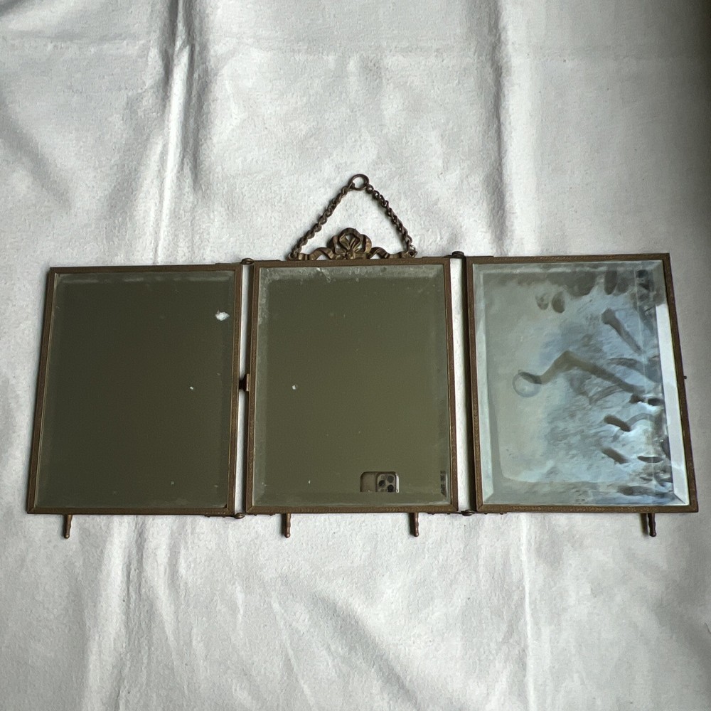 Antique Brass Tri-Fold Celluloid Cherub Hanging Vanity Mirror