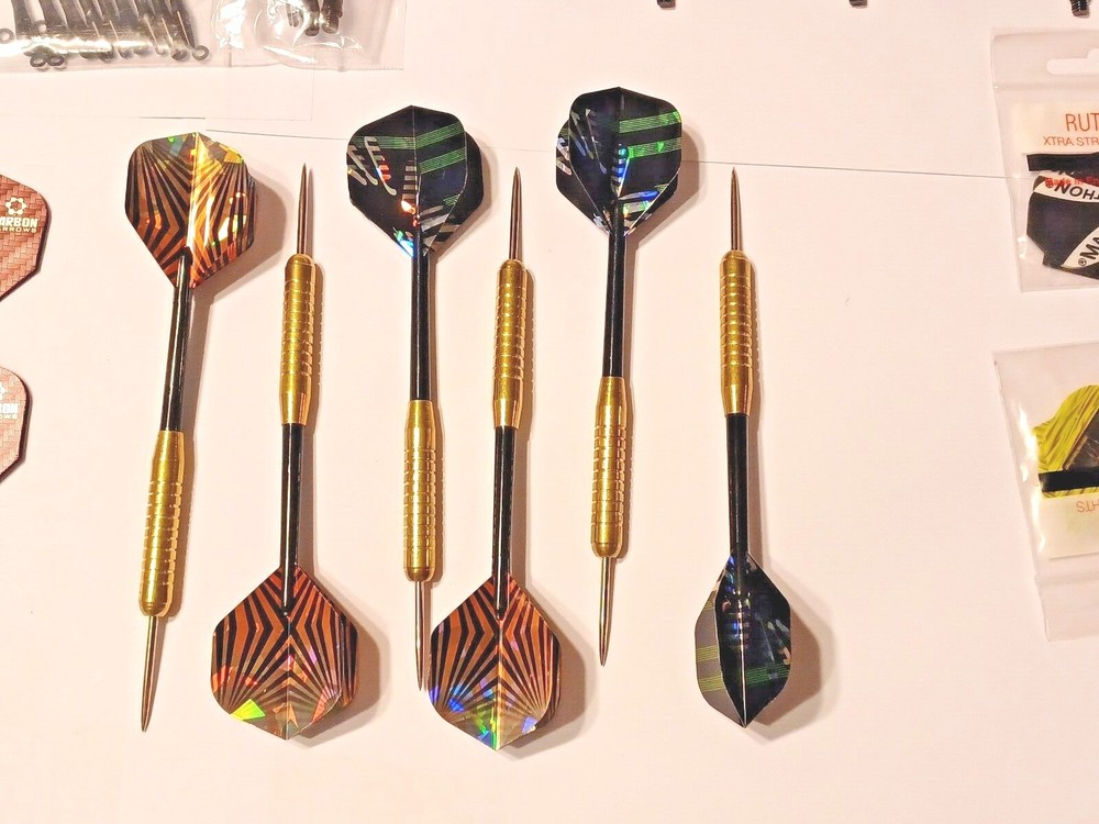 6 Darts And Accessories
