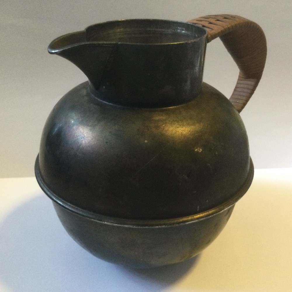 vintage silver plated pitcher with rattan handle