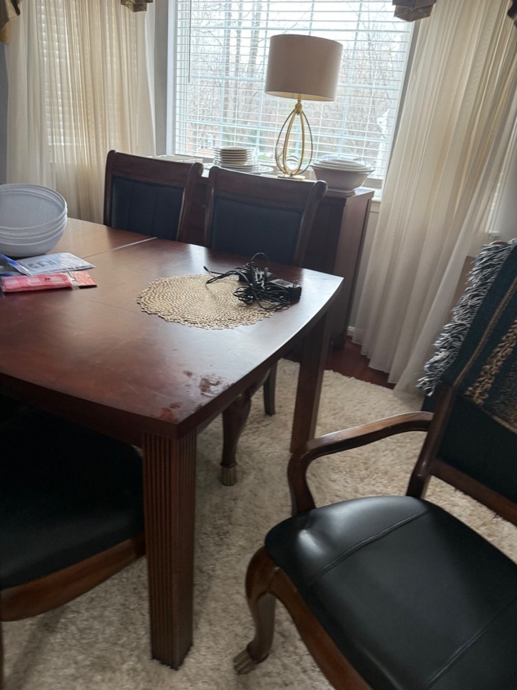 dining table wood with leaf , cherry wood a few scratches .