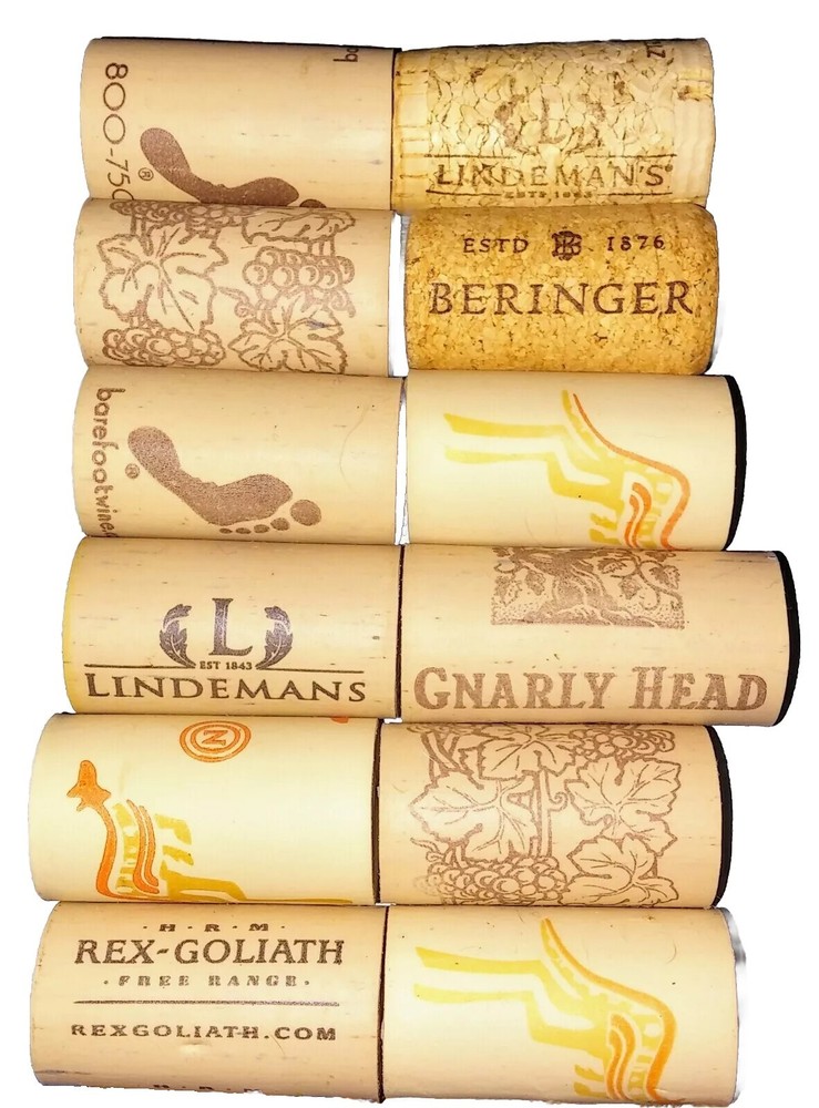 12 Random Wine Corks.  Used.  Crating.