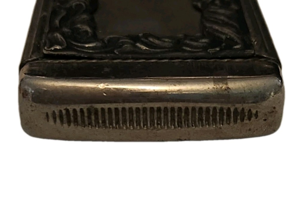 Vintage Vesta Case with Bear Pattern and Ornate Frame Design