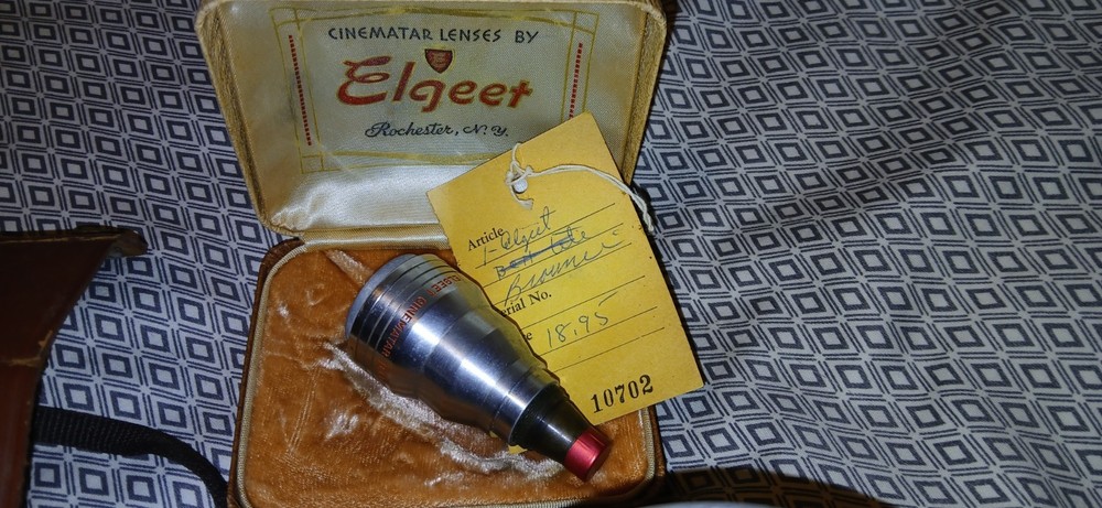 Vintage Camera,Lens, And Flash Bulb.