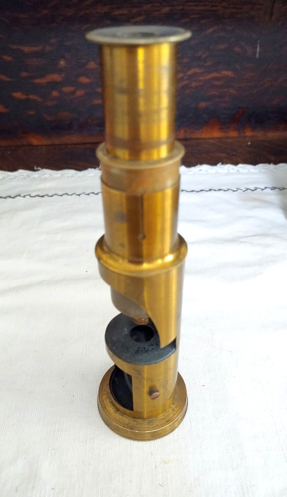 Old brass field microscope