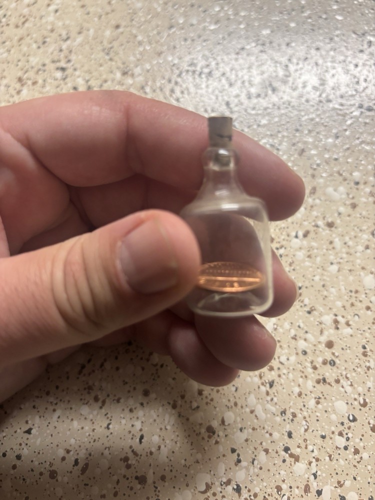 Penny Inside Glass Bottle