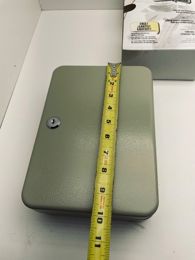 Locking key cabinet holds 48 keys