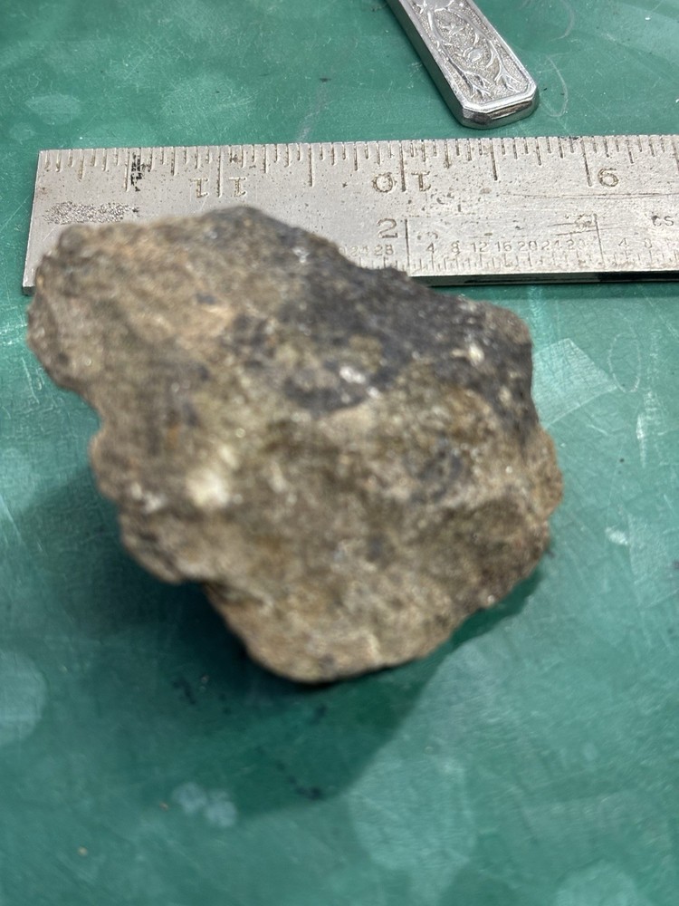 as gold ore on green stone