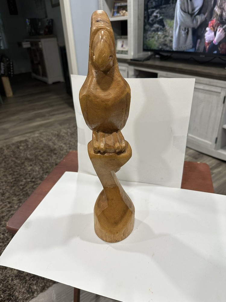 carved wooden parrot