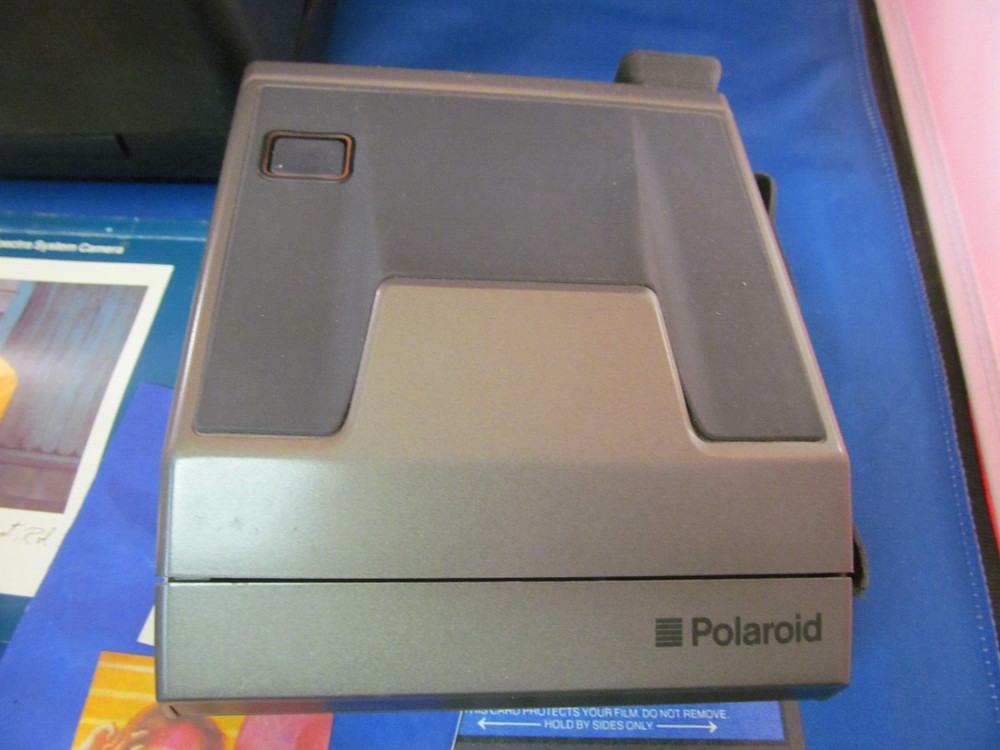 POLAROID SPECTRA SYSTEM CAMERA WITH STRAP CASE & MANUAL UNTESTED