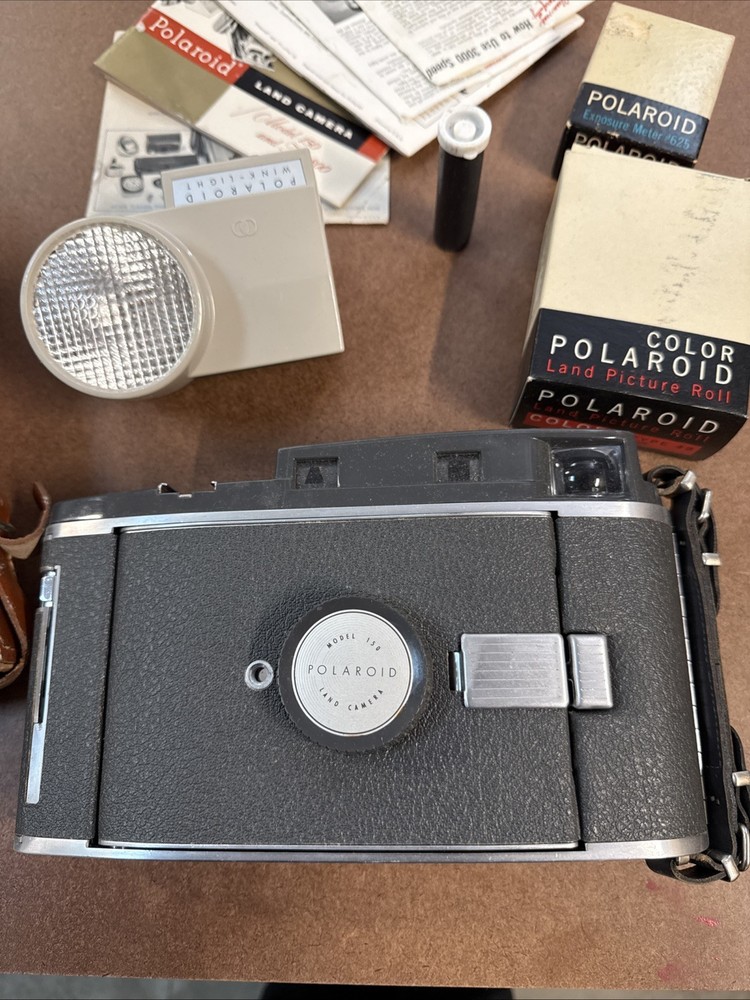 vintage Polaroid Land Camera set includes a camera Model 150 (Case & Accessories