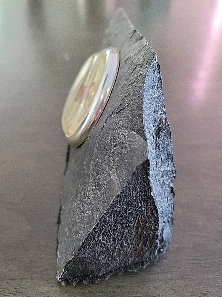 Vintage Desktop Thermometer on Jagged Stone.