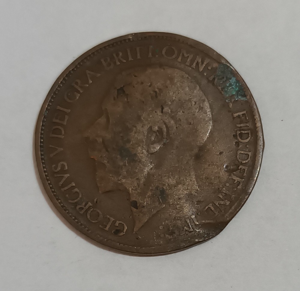 George V and George VI coins with error