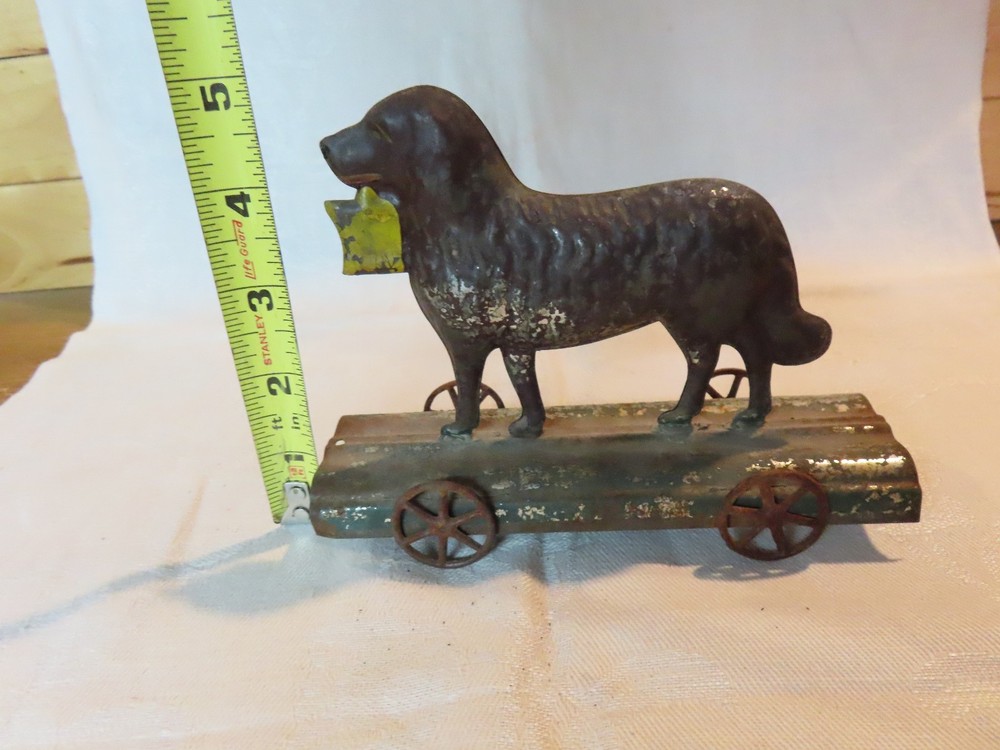 Antique tin dog pull toy