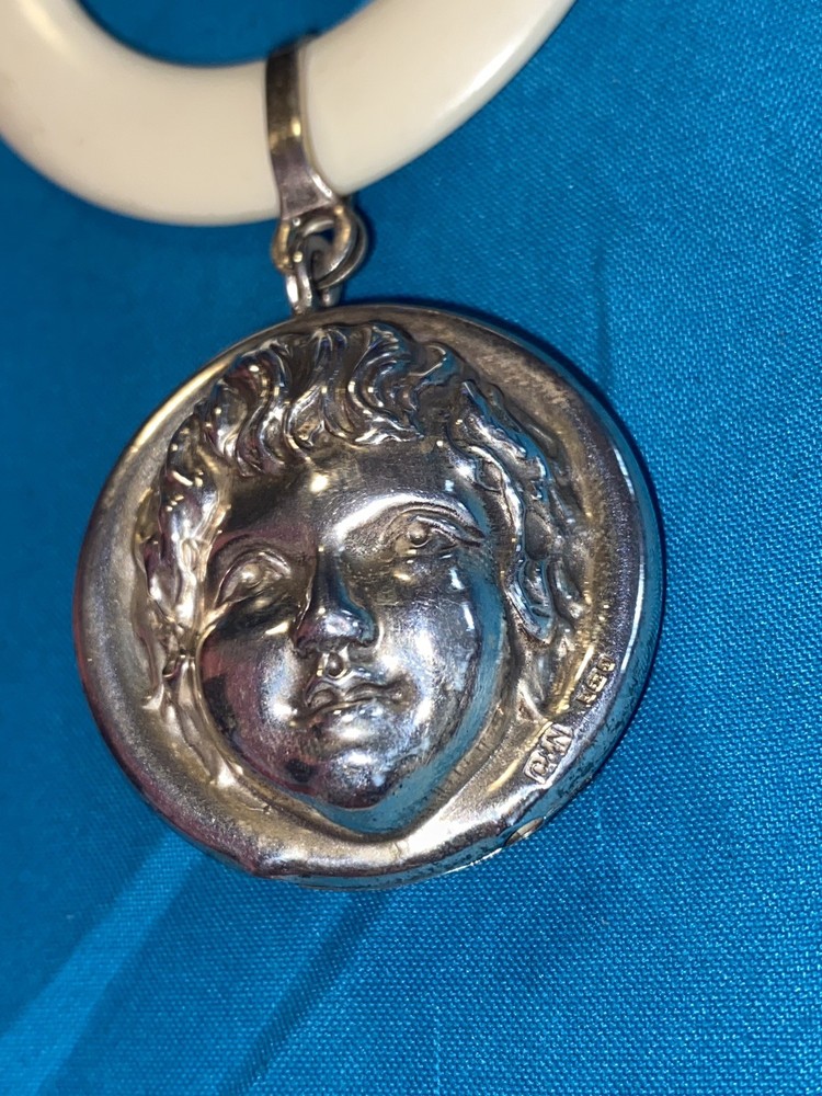 Antique Sterling Silver Babies Rattle Teether ring Crisford & Norris Cherub face