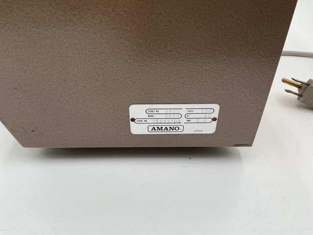 Amano Time Clock 6800 6809 Punch Clock. Keeps time