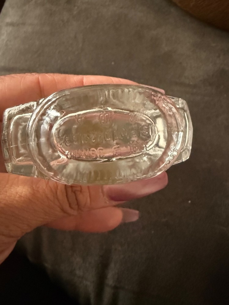 Maple Leaf-Shaped Clear Glass Bottle
