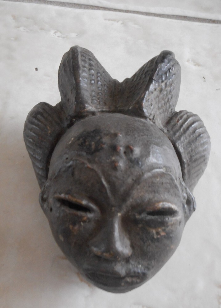 african terracotta punu mask miniature