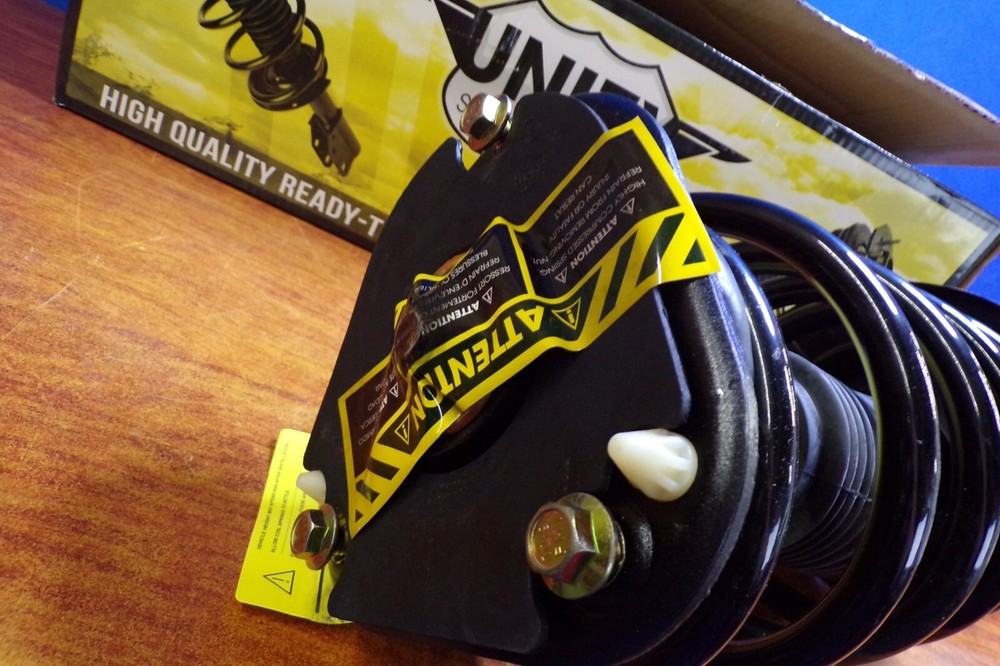 Unity Automotive 11450 Front Complete Strut Assembly - NOS