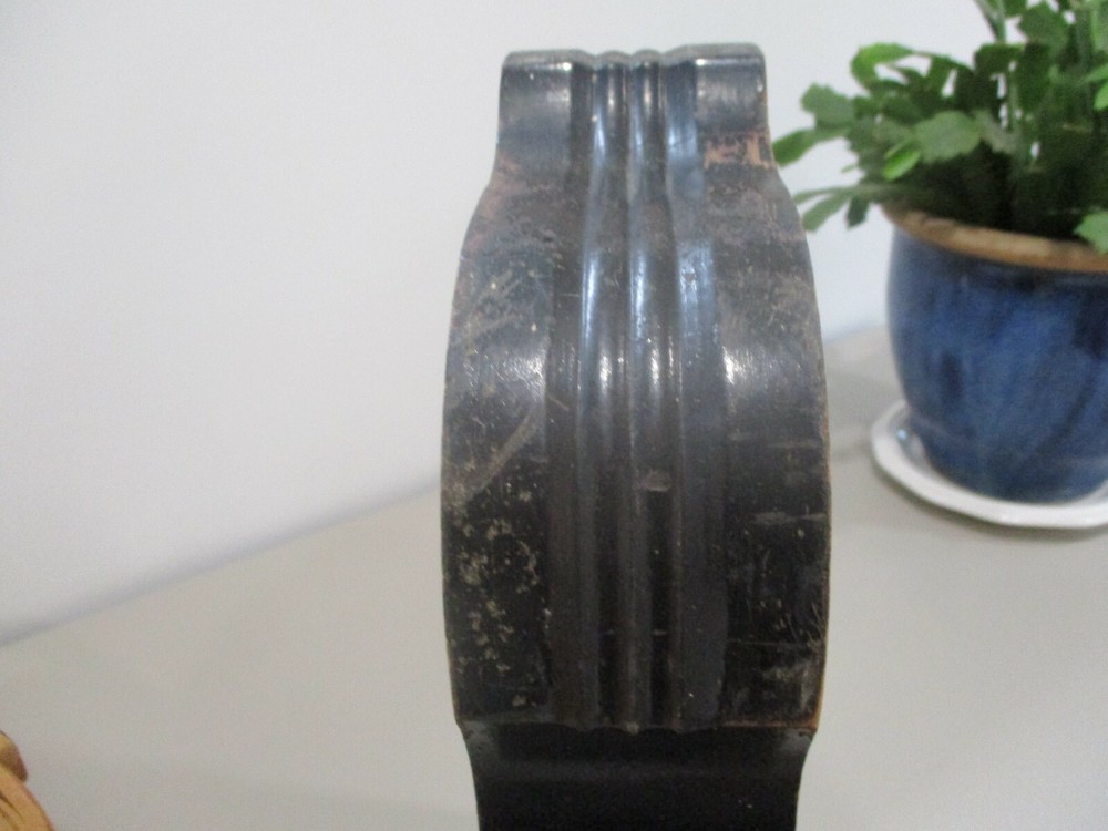 Antique painted black corbel.