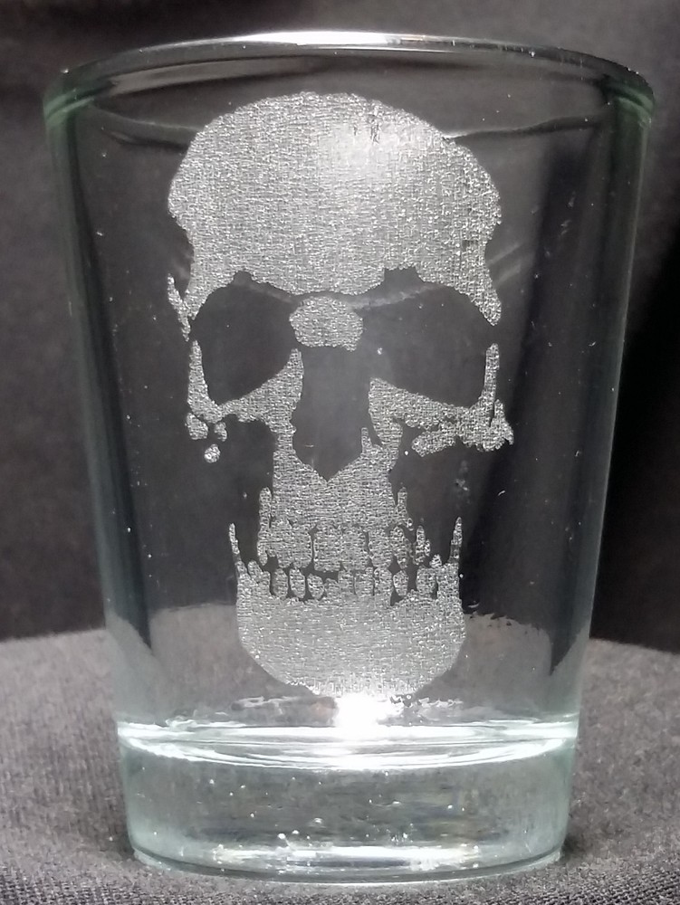 2 Skull etched shot glass. Can be personalized. Different designs available!