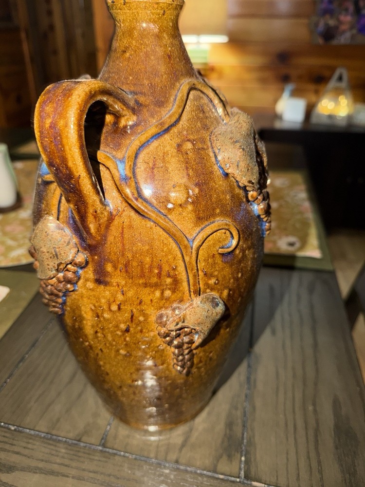 J. Cofer Handmade Brown Glossy Ceramic Jug with Grapes Pattern, 2014