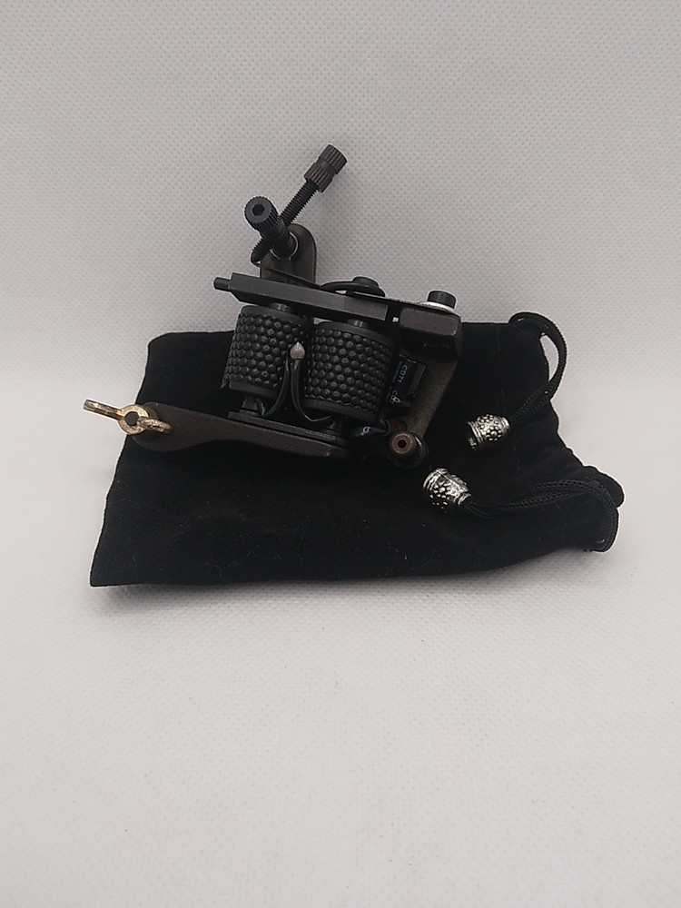 Red Coil Tattoo Machine with Engraved Design