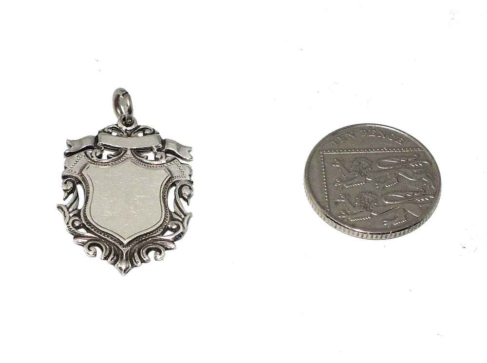 Gents/mens ornate solid silver shield shaped fob