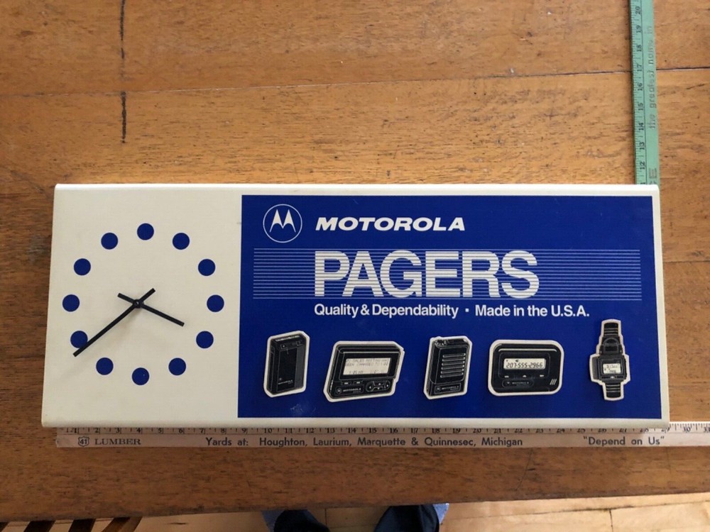 Vintage Motorola clock sign