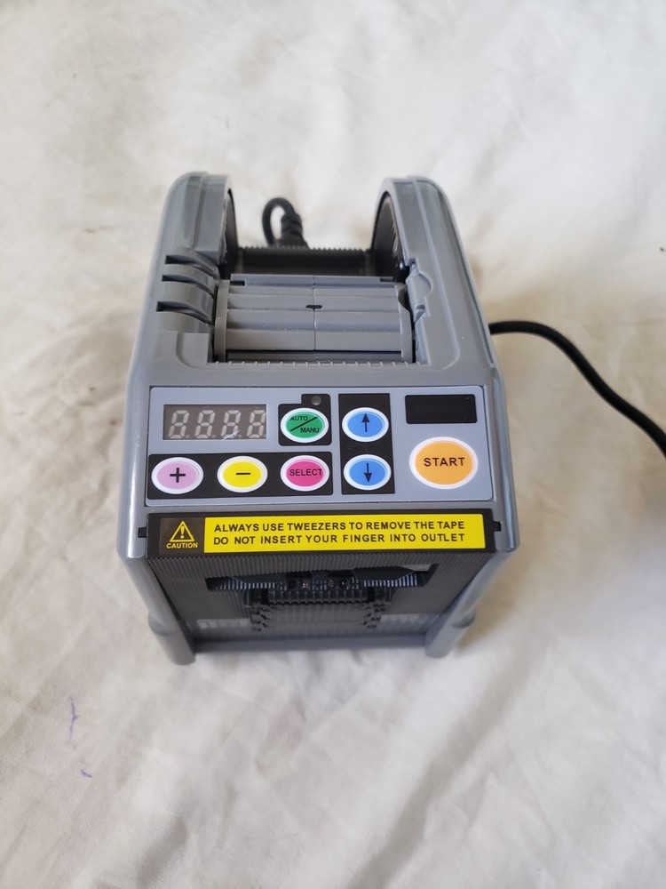 RT-7000 AUTOMATIC TAPE CUTTING MACHINE