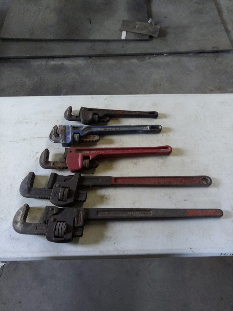 assorted pipe wrenchs