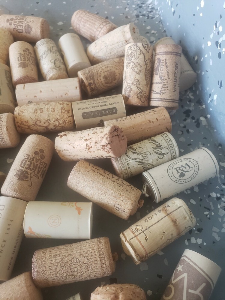 About 85 Used Wine Bottle Corks. Abundant variety.