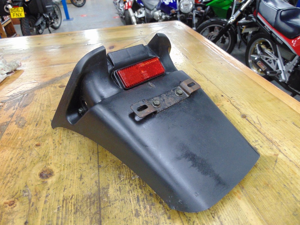 SYM XS125-K 2015 NUMBER PLATE HOLDER GUARD