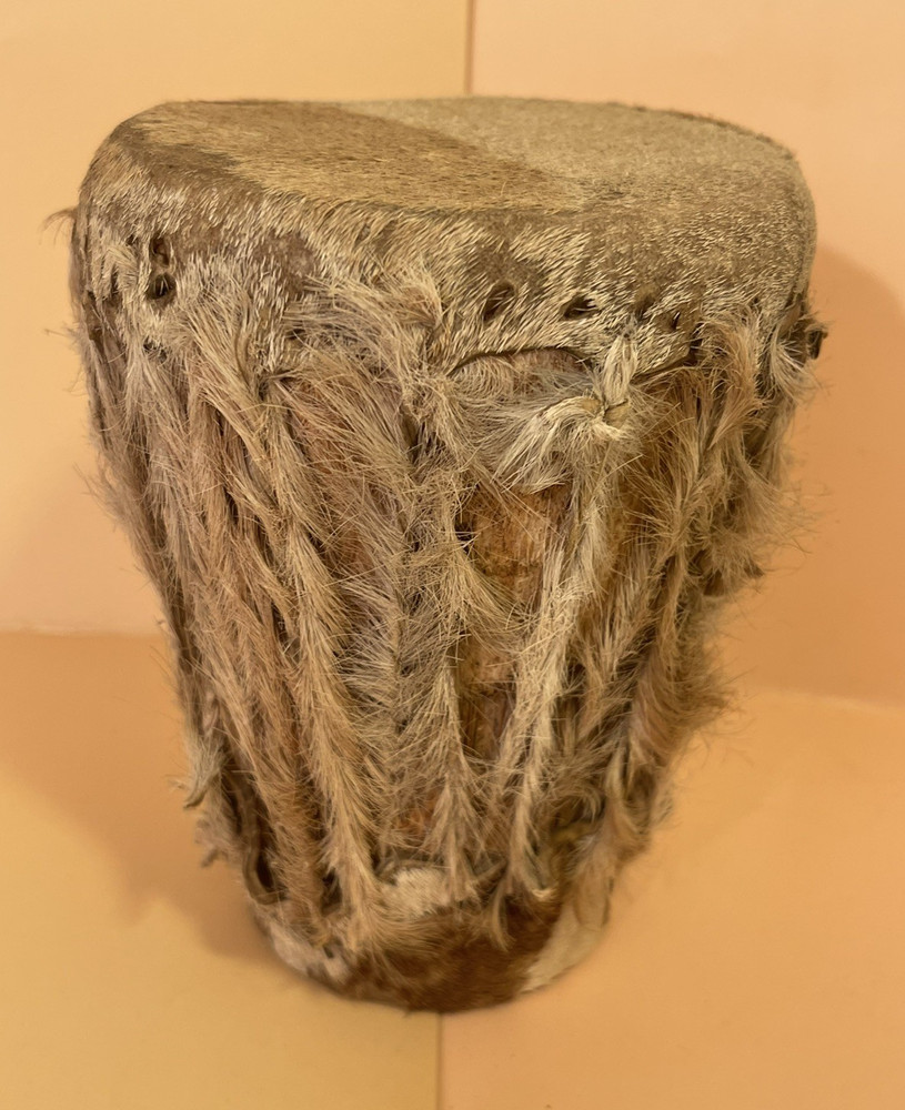 A small vintage hand drum