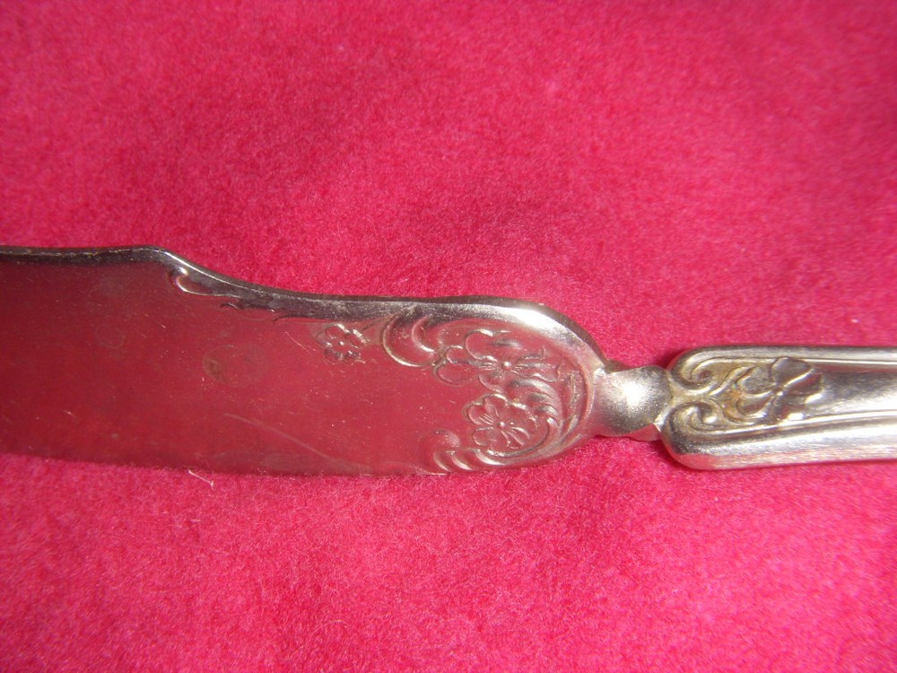 WM A ROGERS TWISTED HANDLE MASTER BUTTER KNIFE