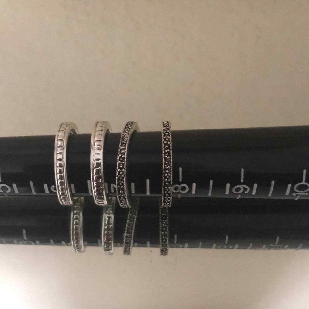 Silver stackable rings (4) costume jewelry