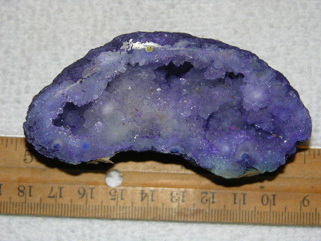Geode cut & polished half with colored crystal center 3.5 inch E56