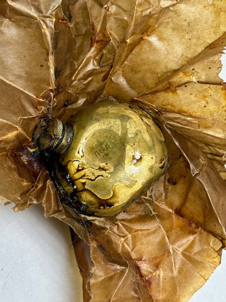 ORIGINAL RUSSIAN MOSIN NAGANT BRASS TURTLE OILER IN ORIGINAL PACKAGE.