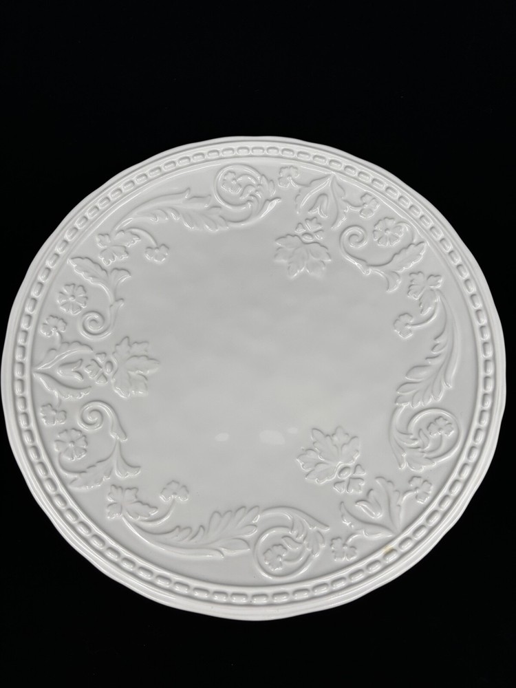 Large Pier 1 cake stand white with a floral pattern