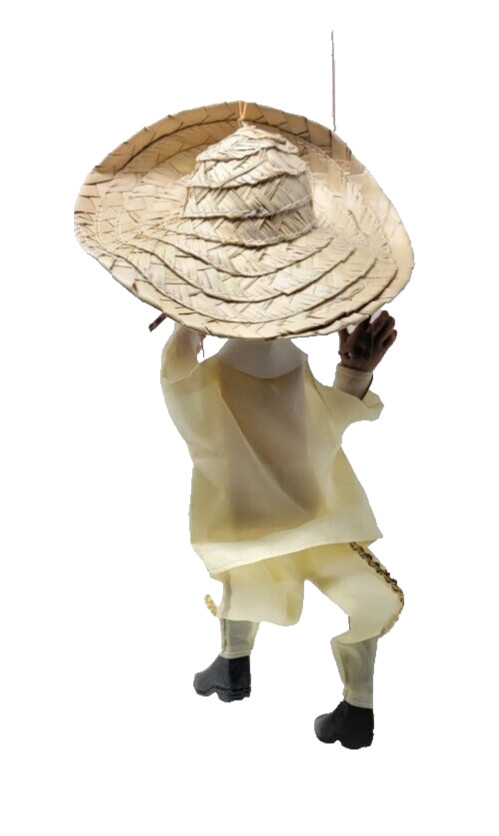 traditional mexican marionette puppet with plastic guns