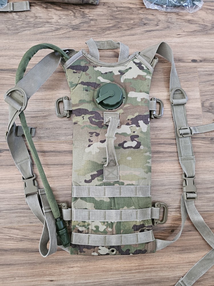 4 USGI OCP Camelbacks with New In plastic Bladders