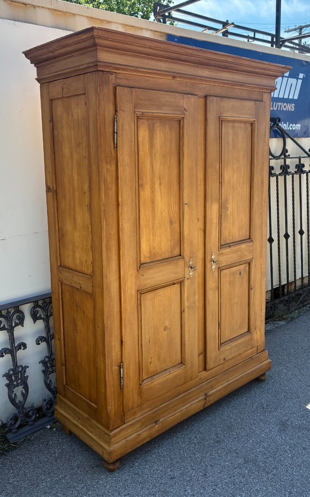 Antique Two Door Eight Panel Knock-Down Armoire