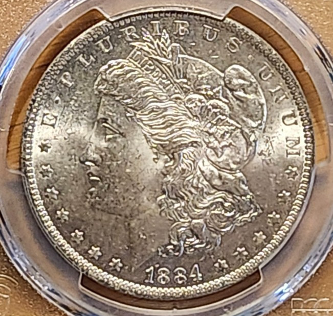 1884 O PCGS MS62 Morgan 90% SILVER
