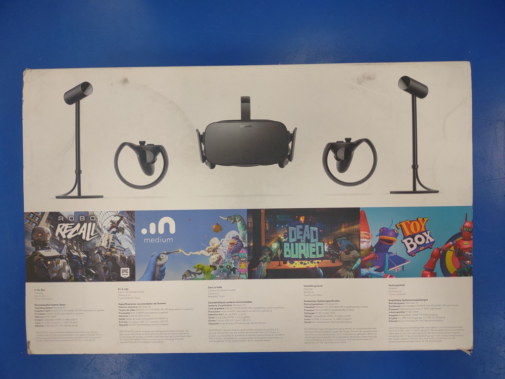 Oculus Rift VR Headset with controllers, sensors, and original box
